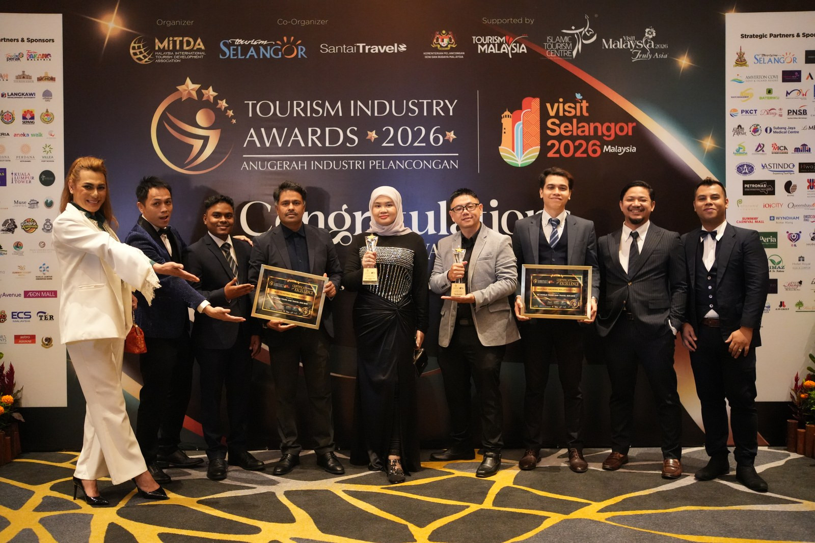 mynztrip team receiving awards at the Tourism Industry Awards 2026